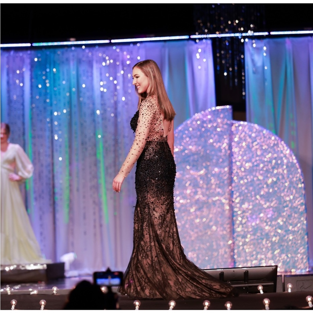 Fully beaded one shoulder gown